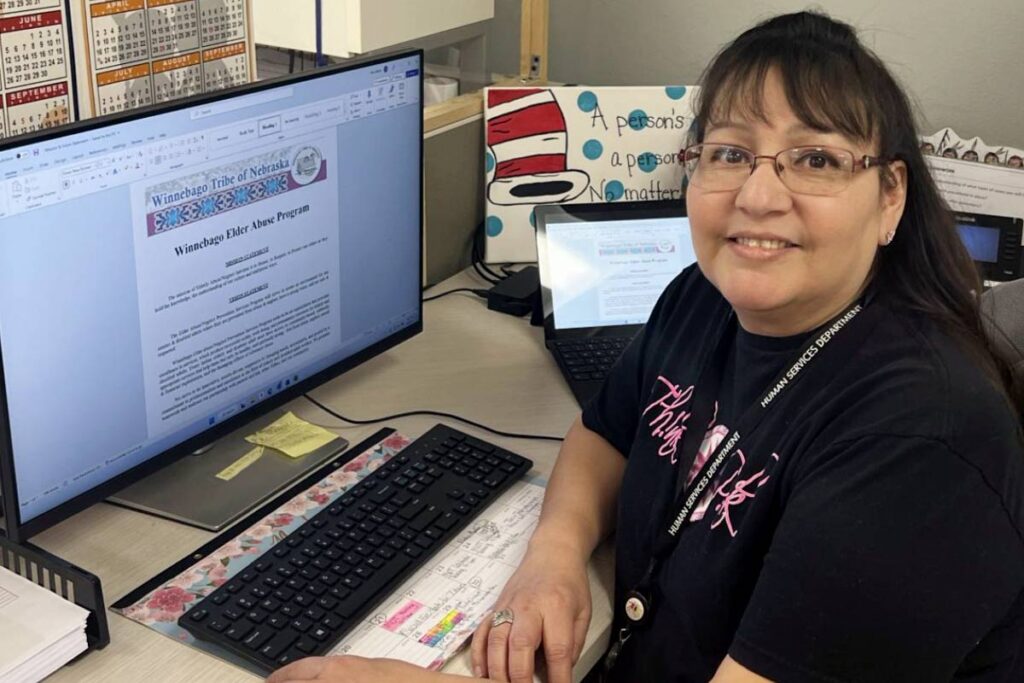 Trina Aldrich at her desk